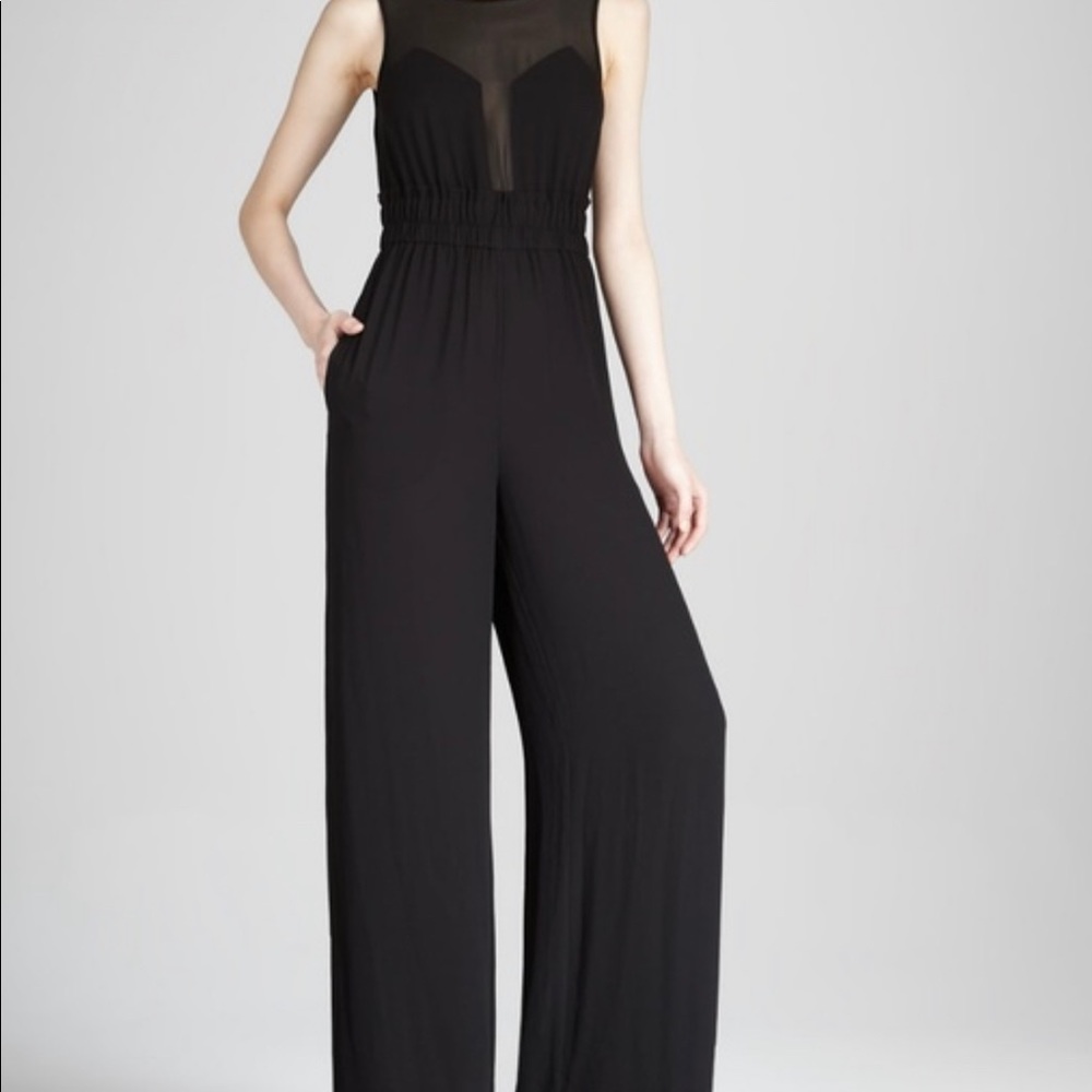 BCBG black jumpsuit with sheer top & pockets